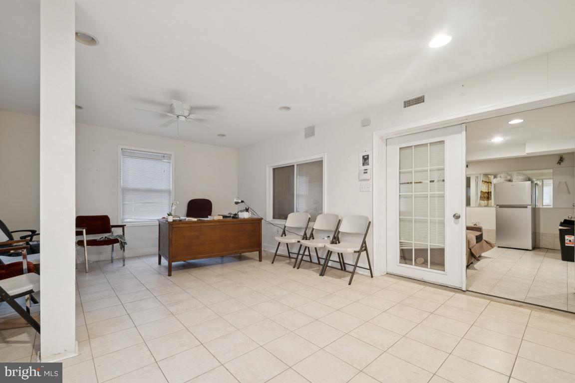 2025 Fairland Road Silver Spring, MD 20904 - Photo 14 of 23 a living room with furniture and a table