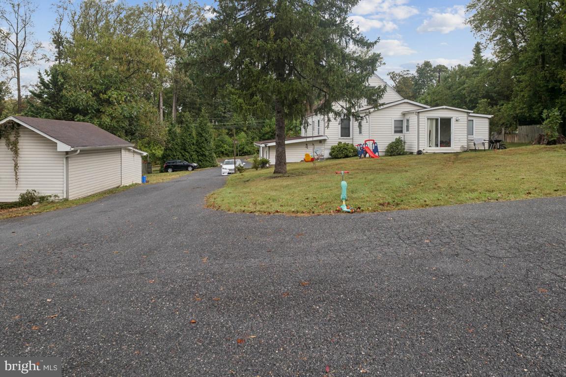 2025 Fairland Road Silver Spring, MD 20904 - Photo 23 of 23 a view of house with outdoor space and parking
