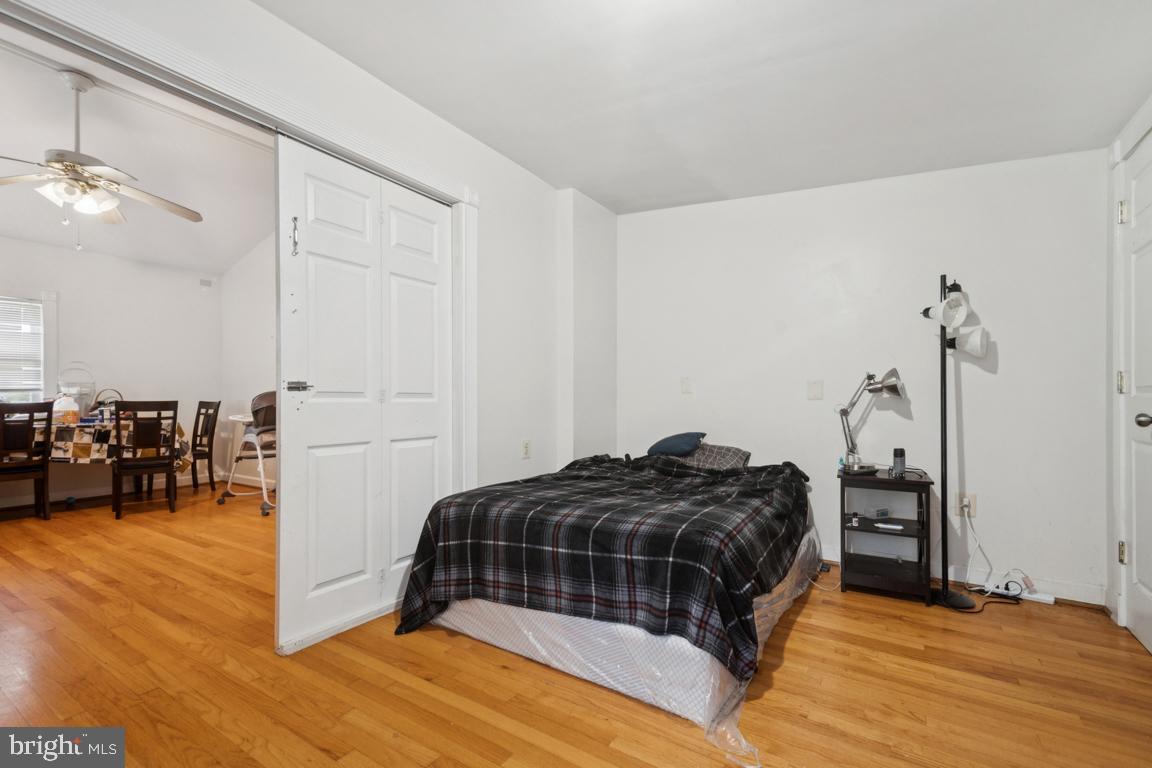 2025 Fairland Road Silver Spring, MD 20904 - Photo 7 of 23 a bedroom with a bed and a view of bathroom