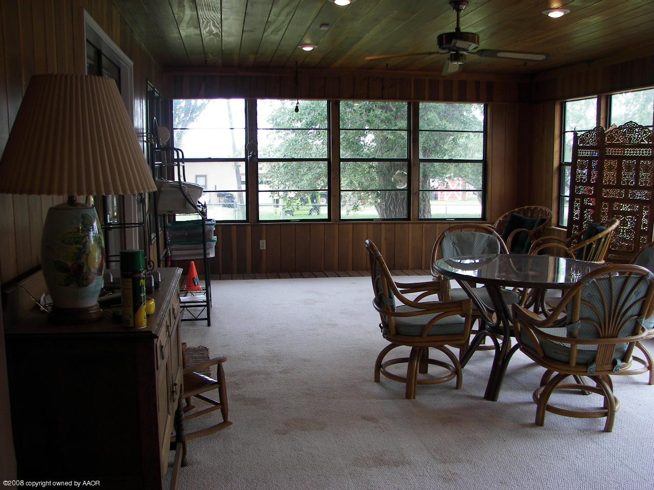 6809 Green Haven Road Amarillo, TX 79110 - Photo 8 of 12 a view of a dining room with furniture window and outside view