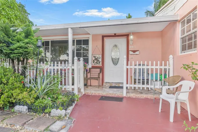 a front view of a house with a porch