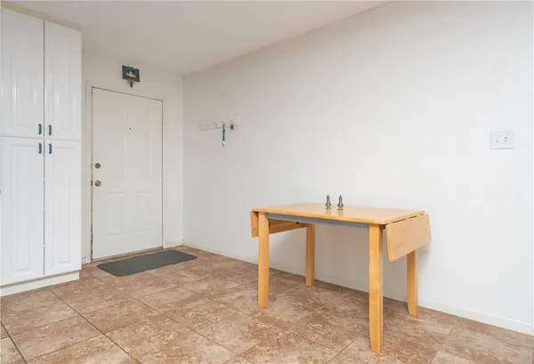 a view of a room with table and chair