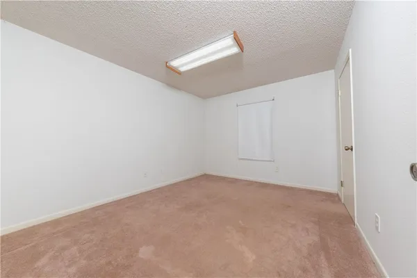 an empty room with an entryway