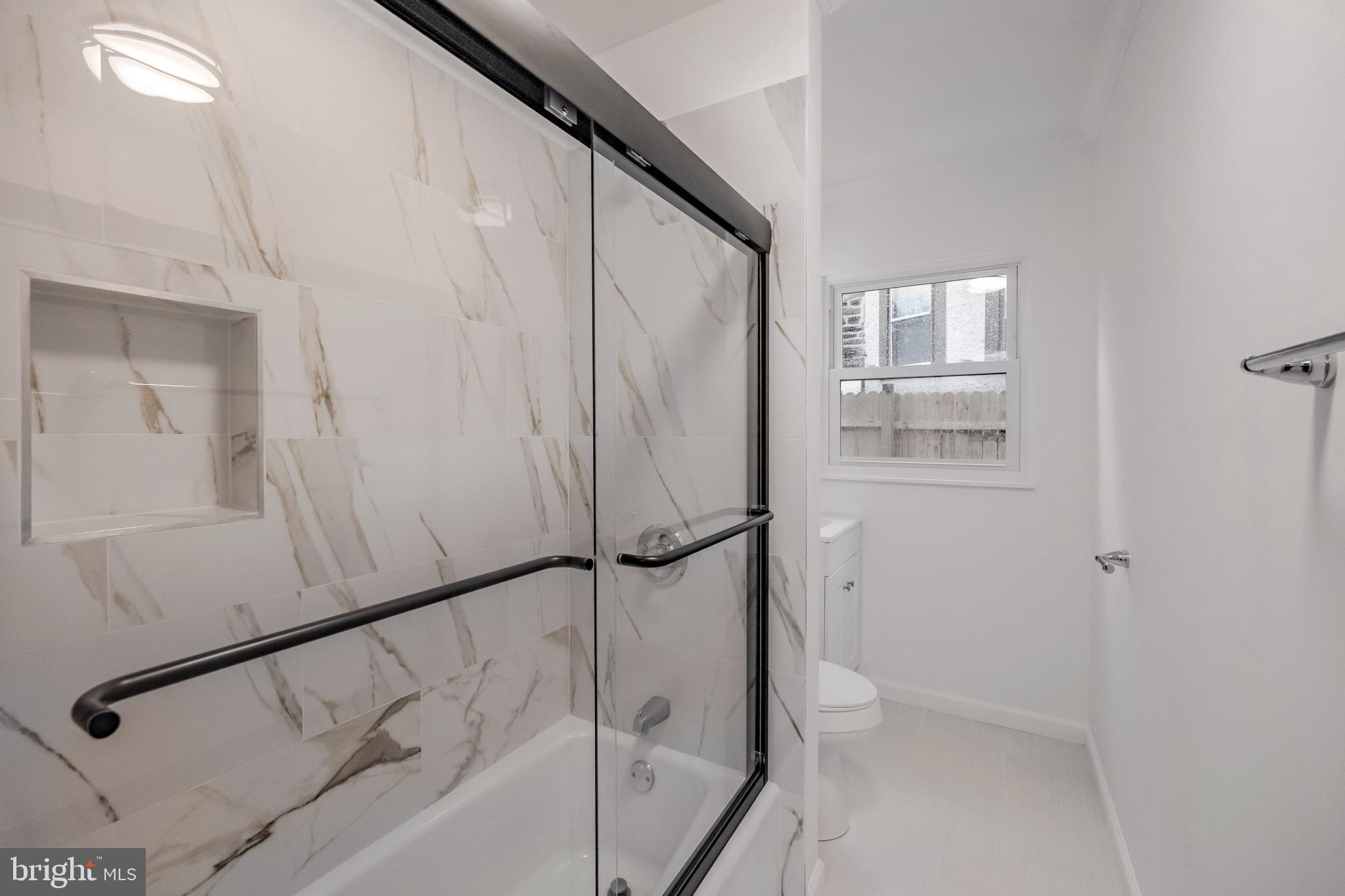 241 South Cedar Lane Upper Darby, PA 19082 - Photo 19 of 29 Sleek modern bathroom with elegant finishes.
