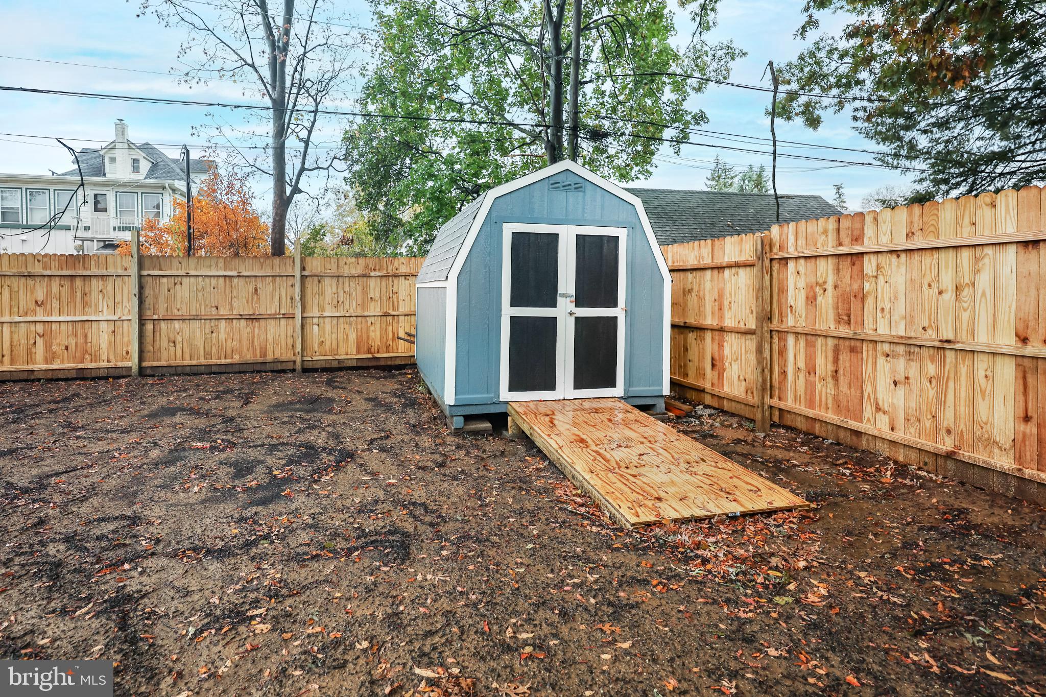 241 South Cedar Lane Upper Darby, PA 19082 - Photo 28 of 29 Charming shed nestled in a private yard.