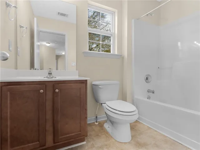 a view of staircase with rug floor