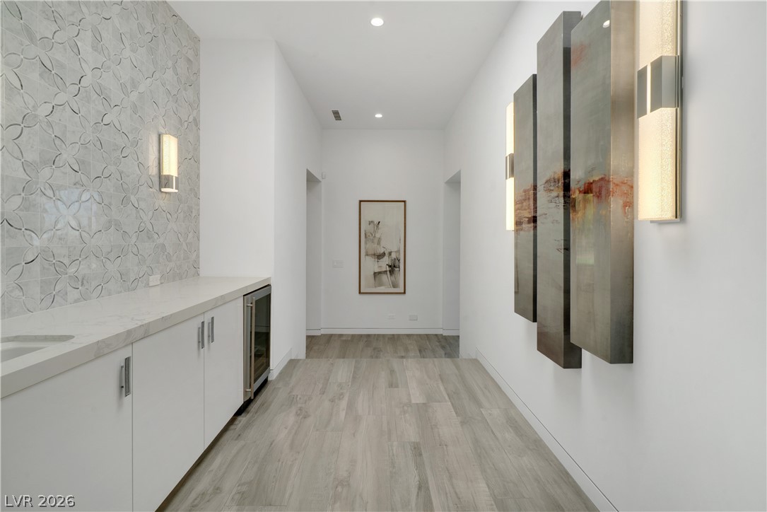 10 Ridge Blossom Road Las Vegas, NV 89135 - Photo 25 of 64 Hallway to Primary Suite and Private Office