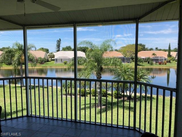 9009 Michael Circle, Unit 1110 Naples, FL 34113 - Photo 15 of 27 a view of a balcony with chairs