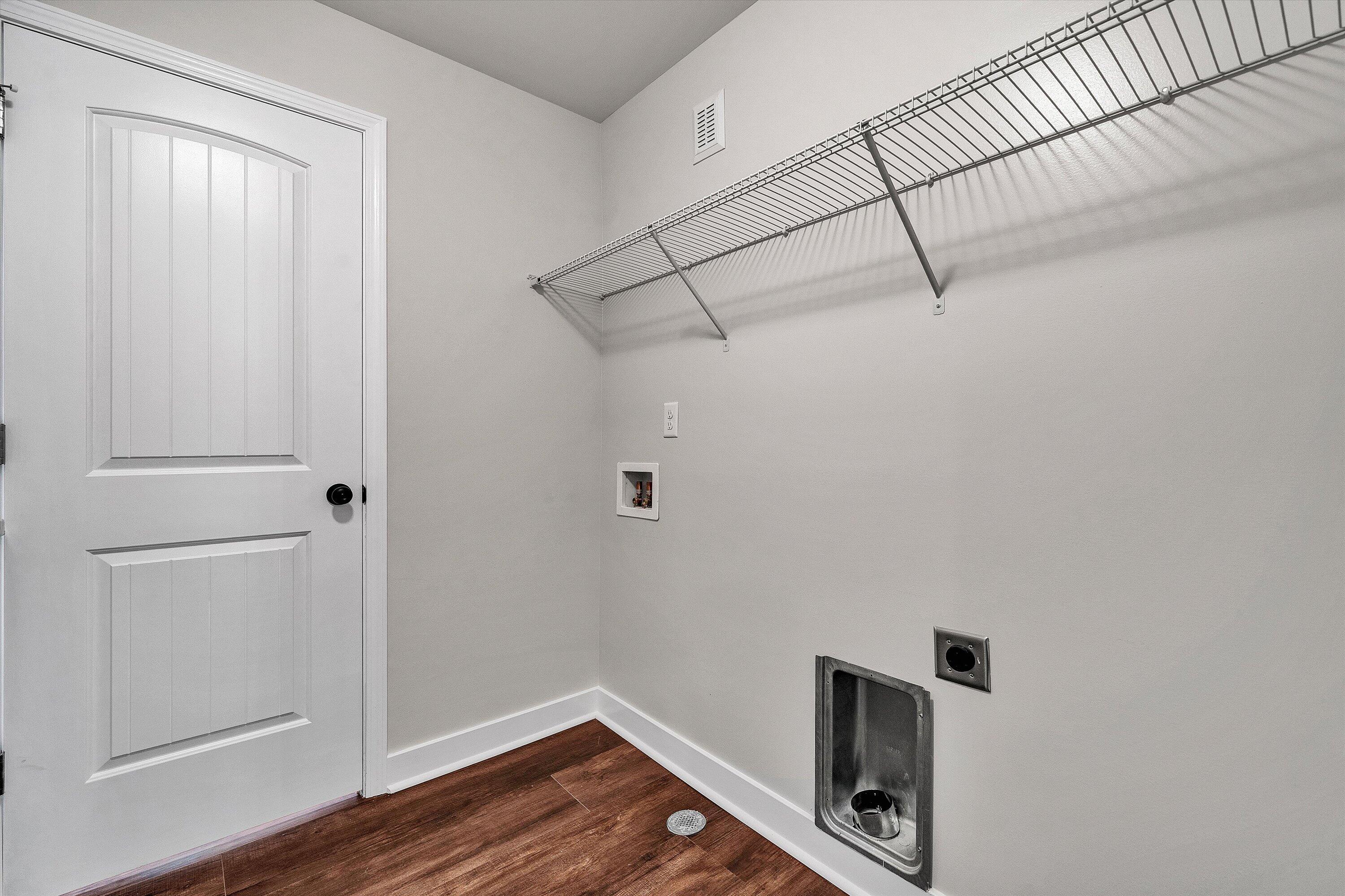 251 Meadow Branch Road Boones Mill, VA 24065 - Photo 17 of 34 a view of a storage & utility room with wooden floor