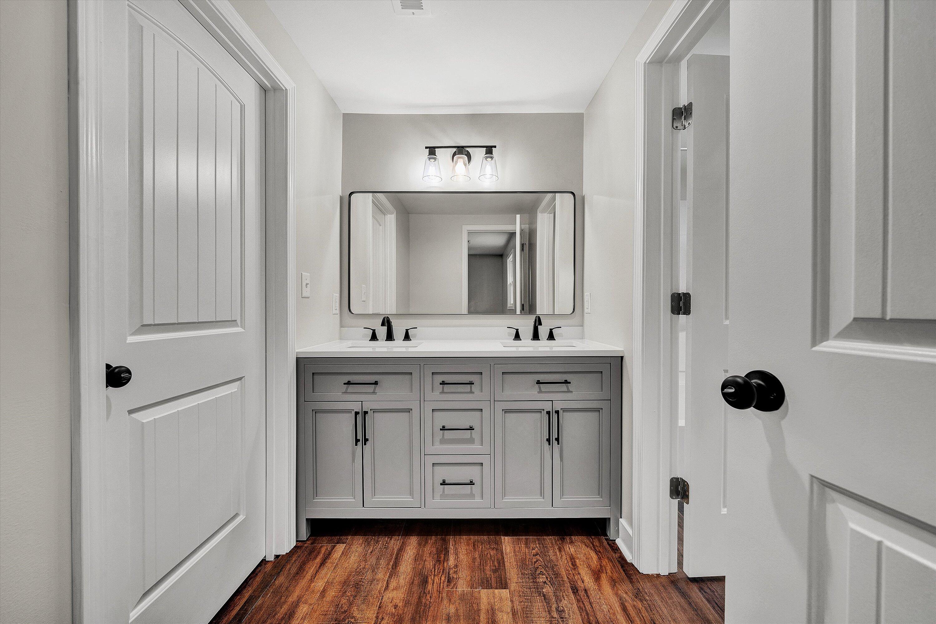 251 Meadow Branch Road Boones Mill, VA 24065 - Photo 21 of 34 a bathroom with a sink and a mirror
