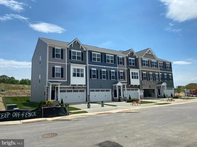 a front view of a building with street view