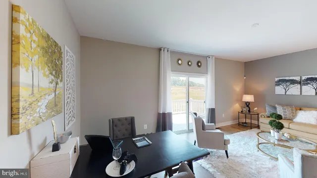 a view of a livingroom with furniture and window