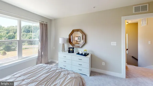 a bed room with a bed and a couch