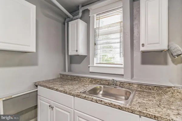 a bathroom with a sink and a bathtub