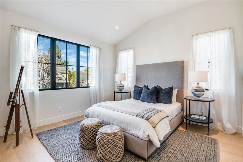 644 29th Street Manhattan Beach, CA 90266 - Photo 24 of 41 a bedroom with a bed and a large window