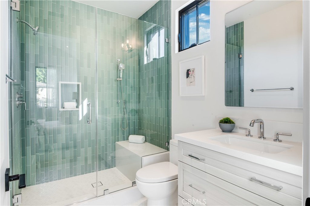 644 29th Street Manhattan Beach, CA 90266 - Photo 27 of 41 a bathroom with a sink toilet and shower