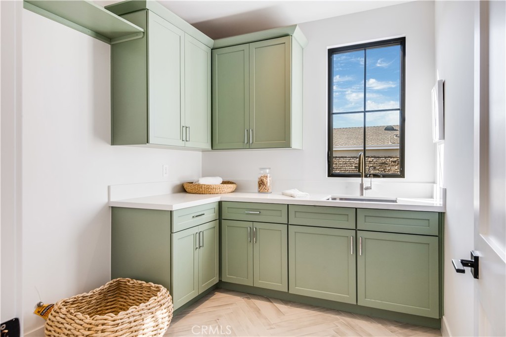 644 29th Street Manhattan Beach, CA 90266 - Photo 31 of 41 a bathroom with a sink and a mirror