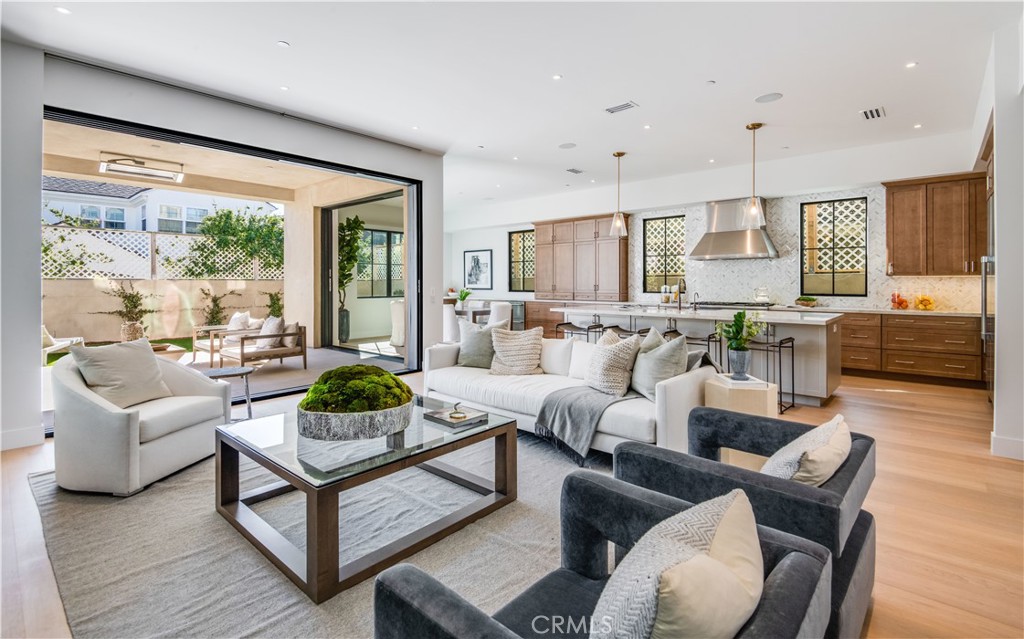 644 29th Street Manhattan Beach, CA 90266 - Photo 7 of 41 a living room with furniture and a large window