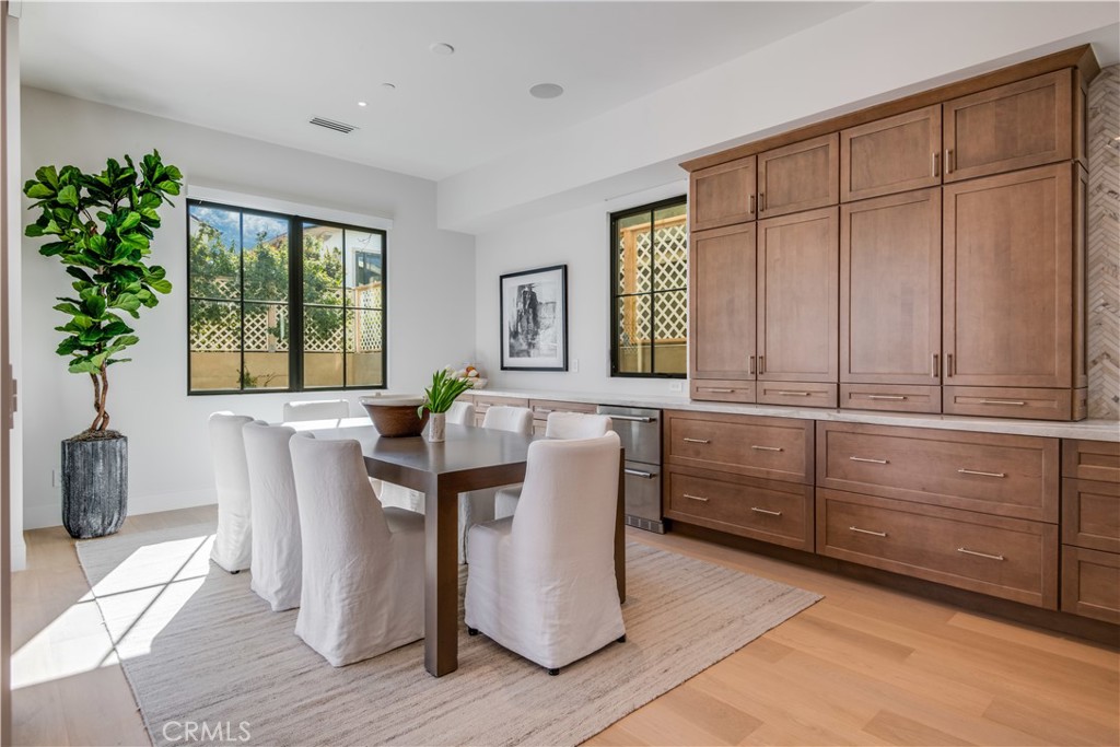 644 29th Street Manhattan Beach, CA 90266 - Photo 9 of 41 a living room with furniture a window and a potted plant