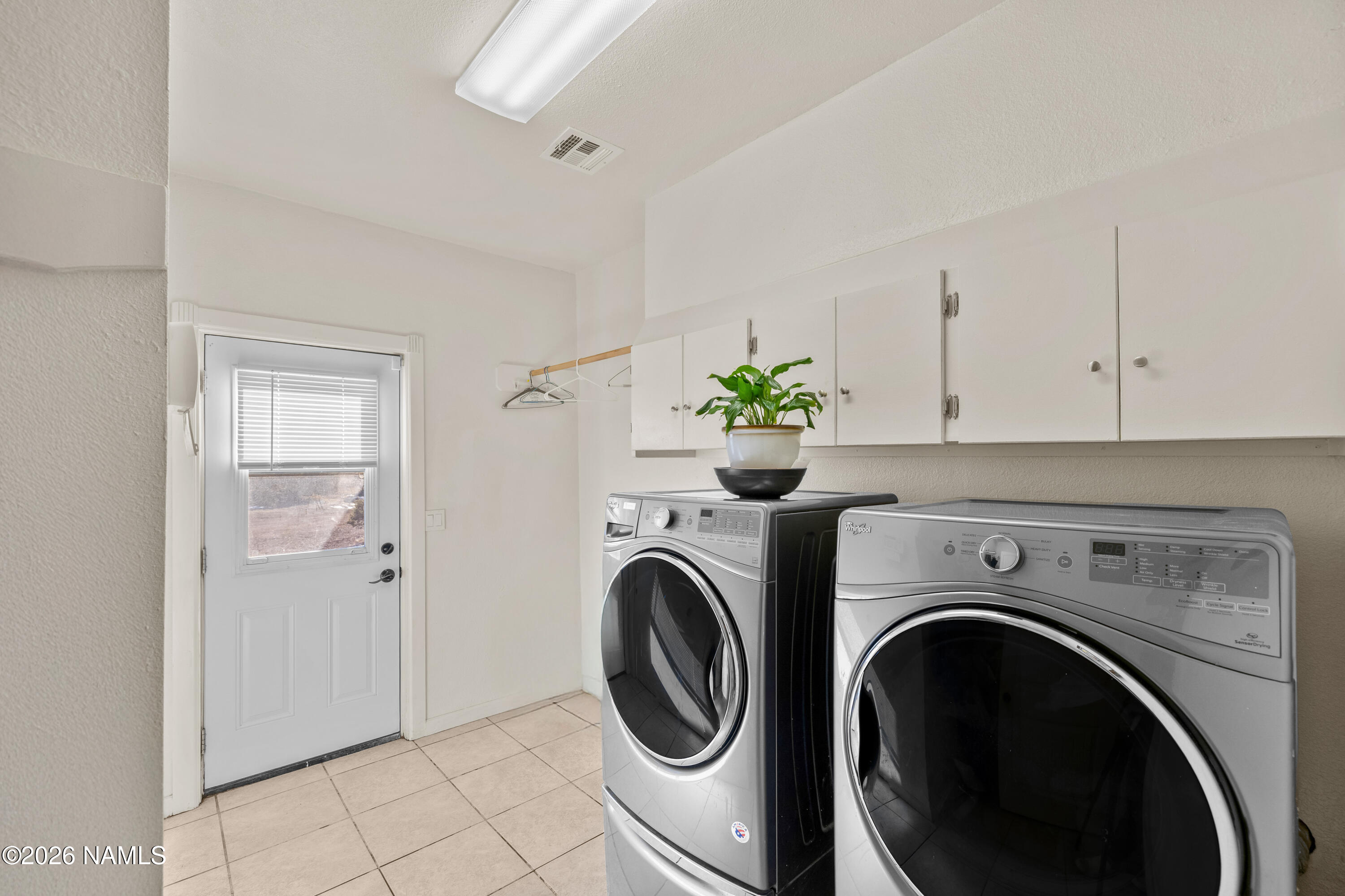 8187 Cassity Trail Williams, AZ 86046 - Photo 14 of 50 a utility room with dryer and washer