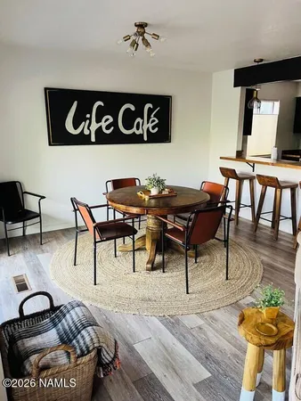 a view of a livingroom and dining room