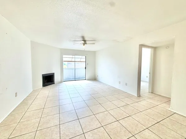 a view of an empty room and window