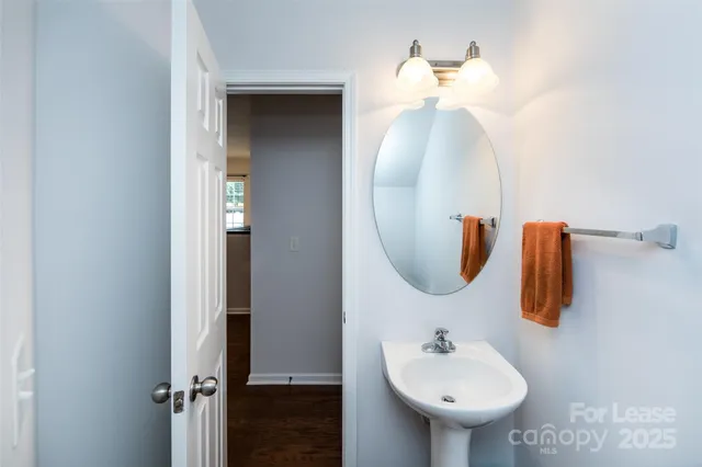 a view of a backyard with pathway