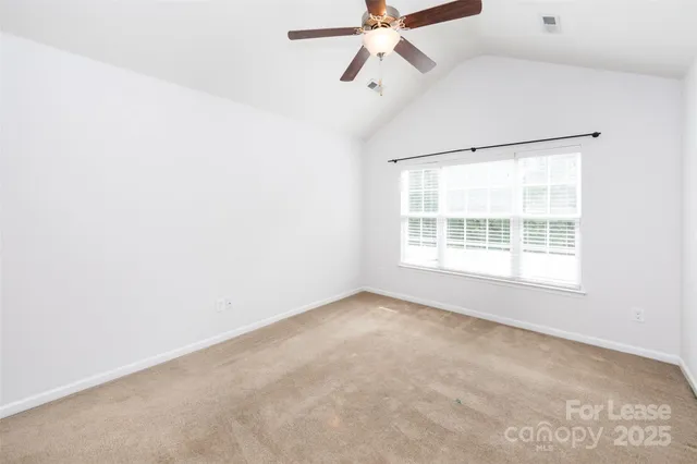 a white bath tub sitting next to a window