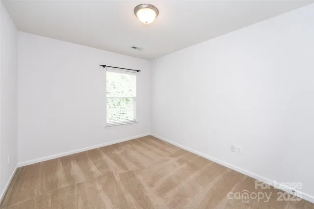 an empty room with an entryway