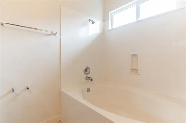 a bathroom with a bathtub