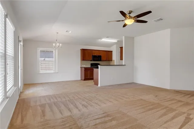 a view of a livingroom with a microwave