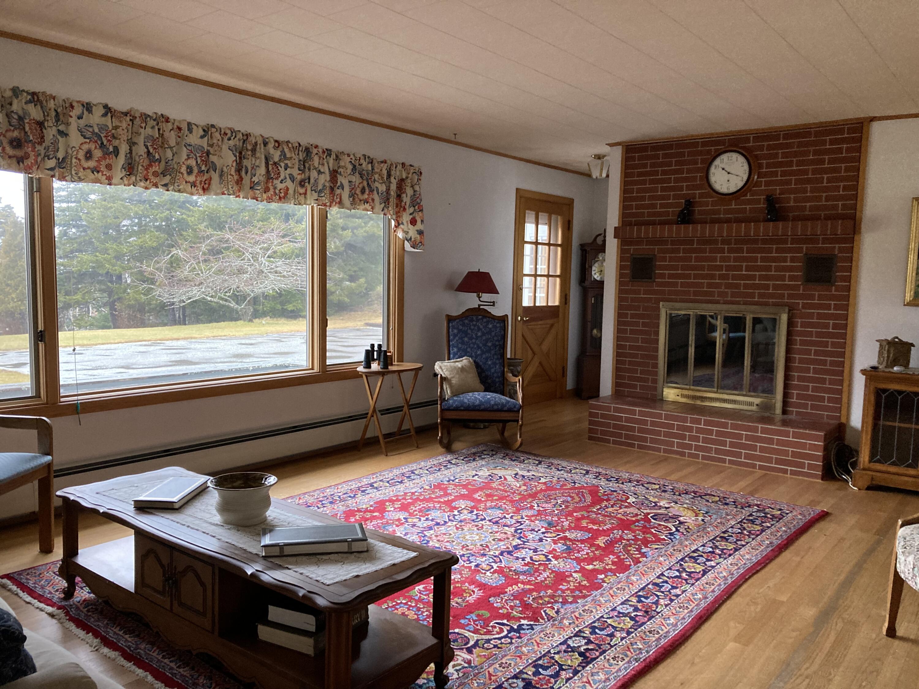 1 Francis Road Steuben, ME 04680 - Photo 10 of 30 Wood burning fireplace in LR