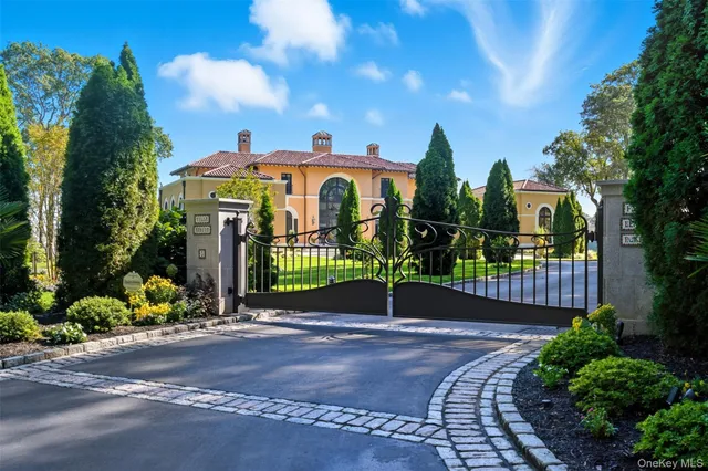 an aerial view of a house with a lake view