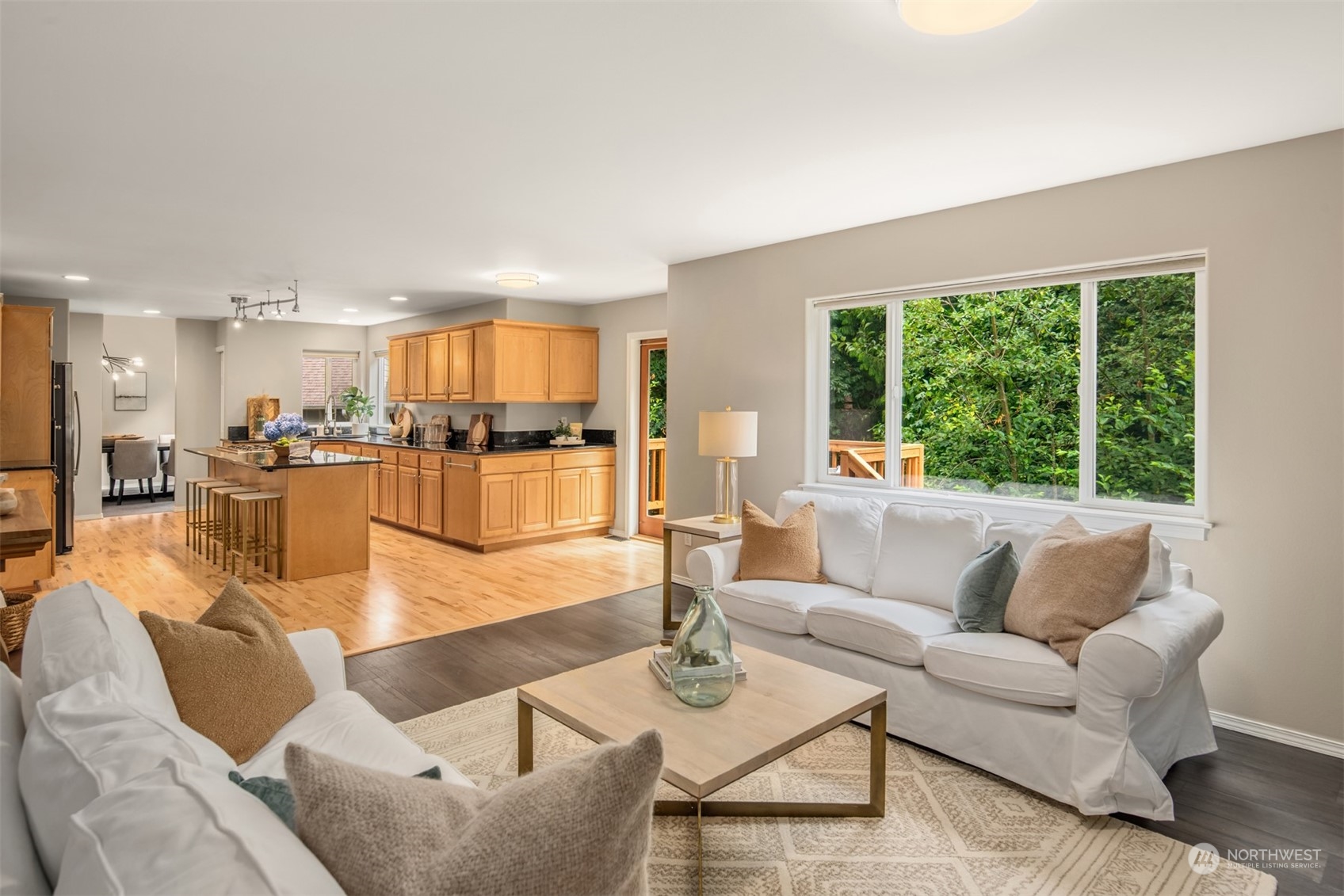23021 21st Avenue Southeast Bothell, WA 98021 - Photo 11 of 29 a living room with furniture and a large window