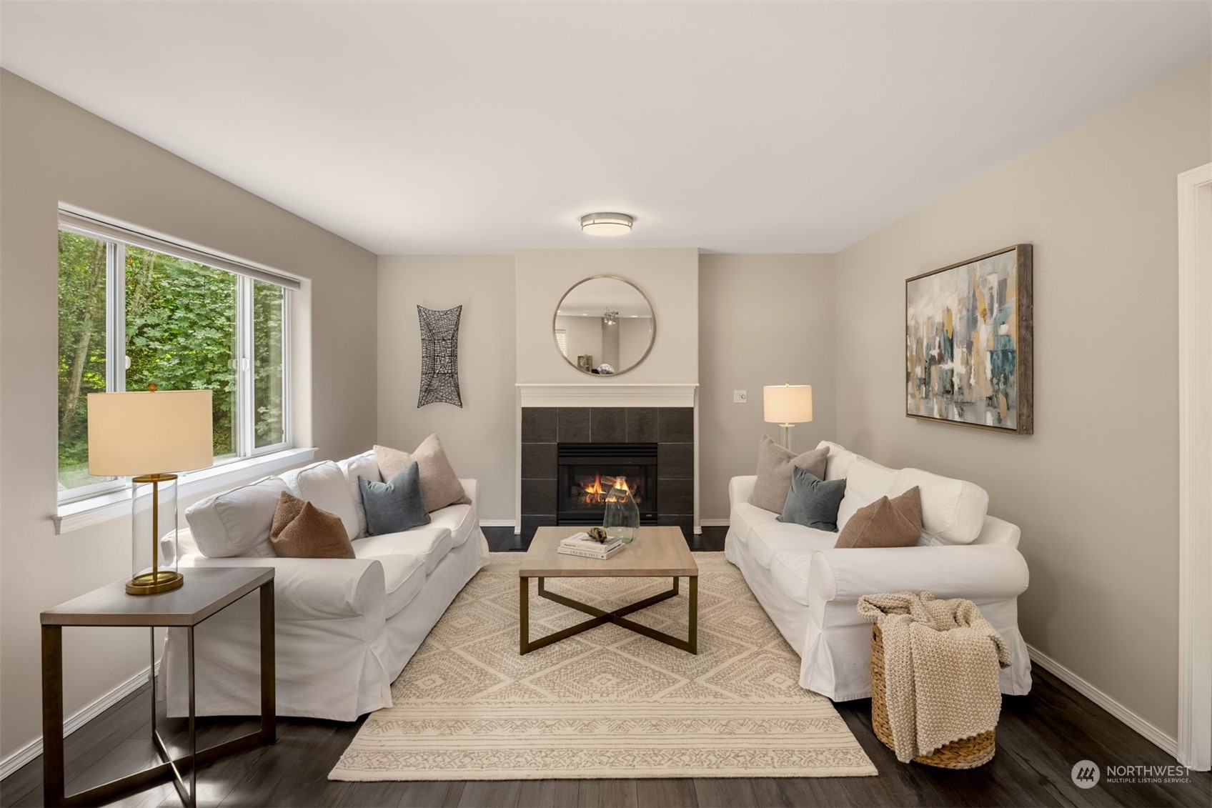 23021 21st Avenue Southeast Bothell, WA 98021 - Photo 12 of 29 a living room with furniture and a fireplace