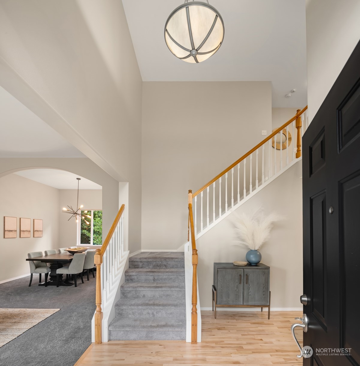23021 21st Avenue Southeast Bothell, WA 98021 - Photo 13 of 29 a view of entryway livingroom and hall with wooden floor