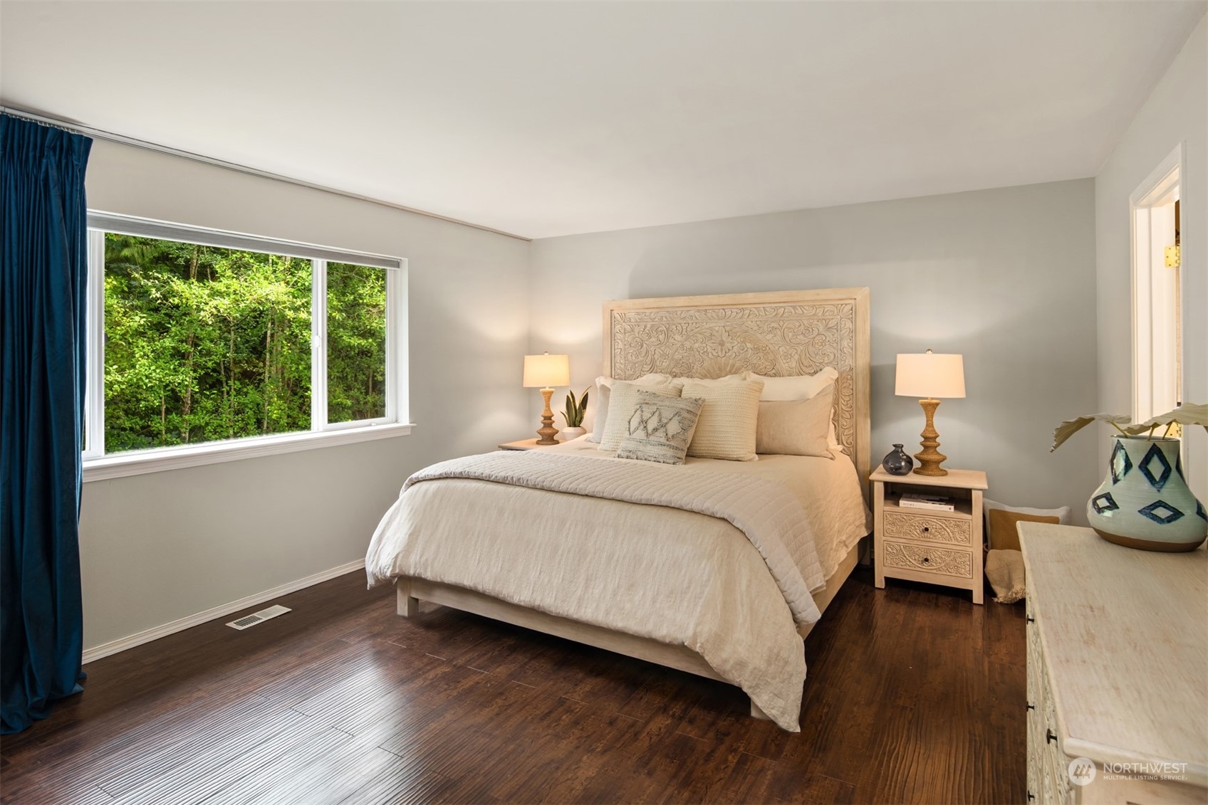 23021 21st Avenue Southeast Bothell, WA 98021 - Photo 15 of 29 a bedroom with a bed and a window