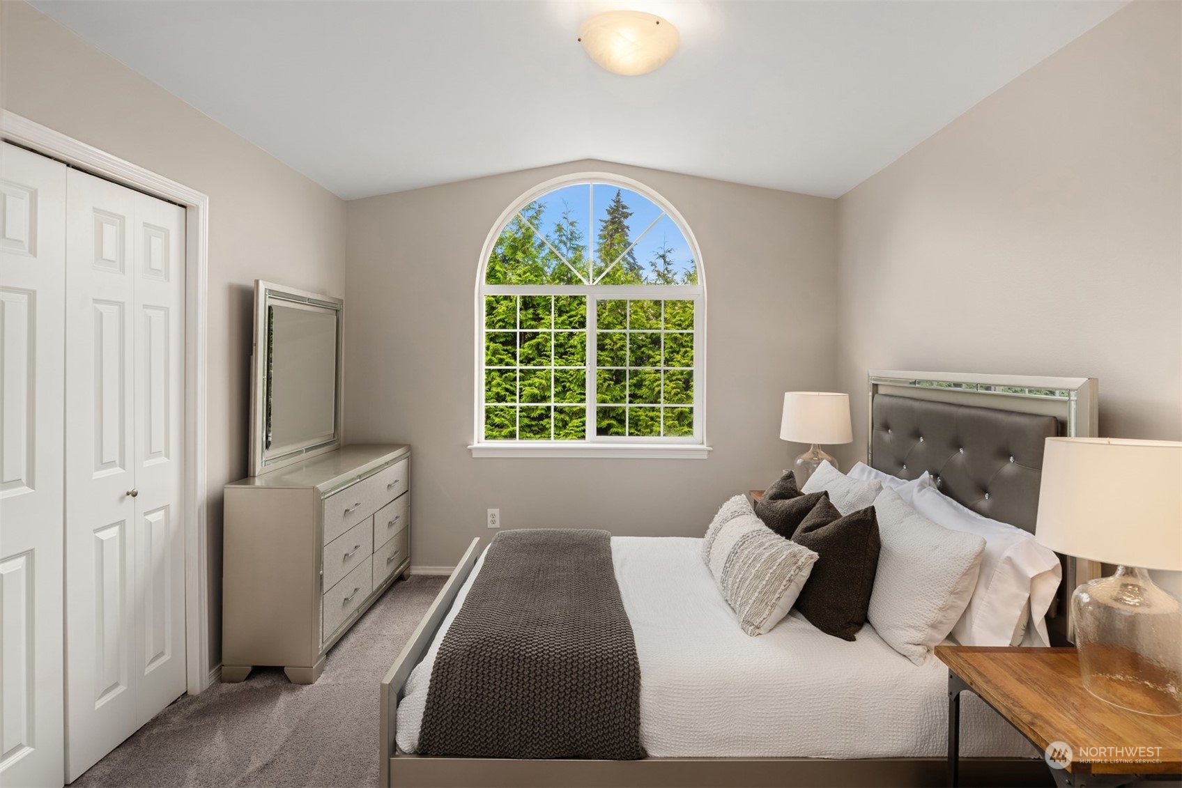 23021 21st Avenue Southeast Bothell, WA 98021 - Photo 19 of 29 a bedroom with a bed and a window