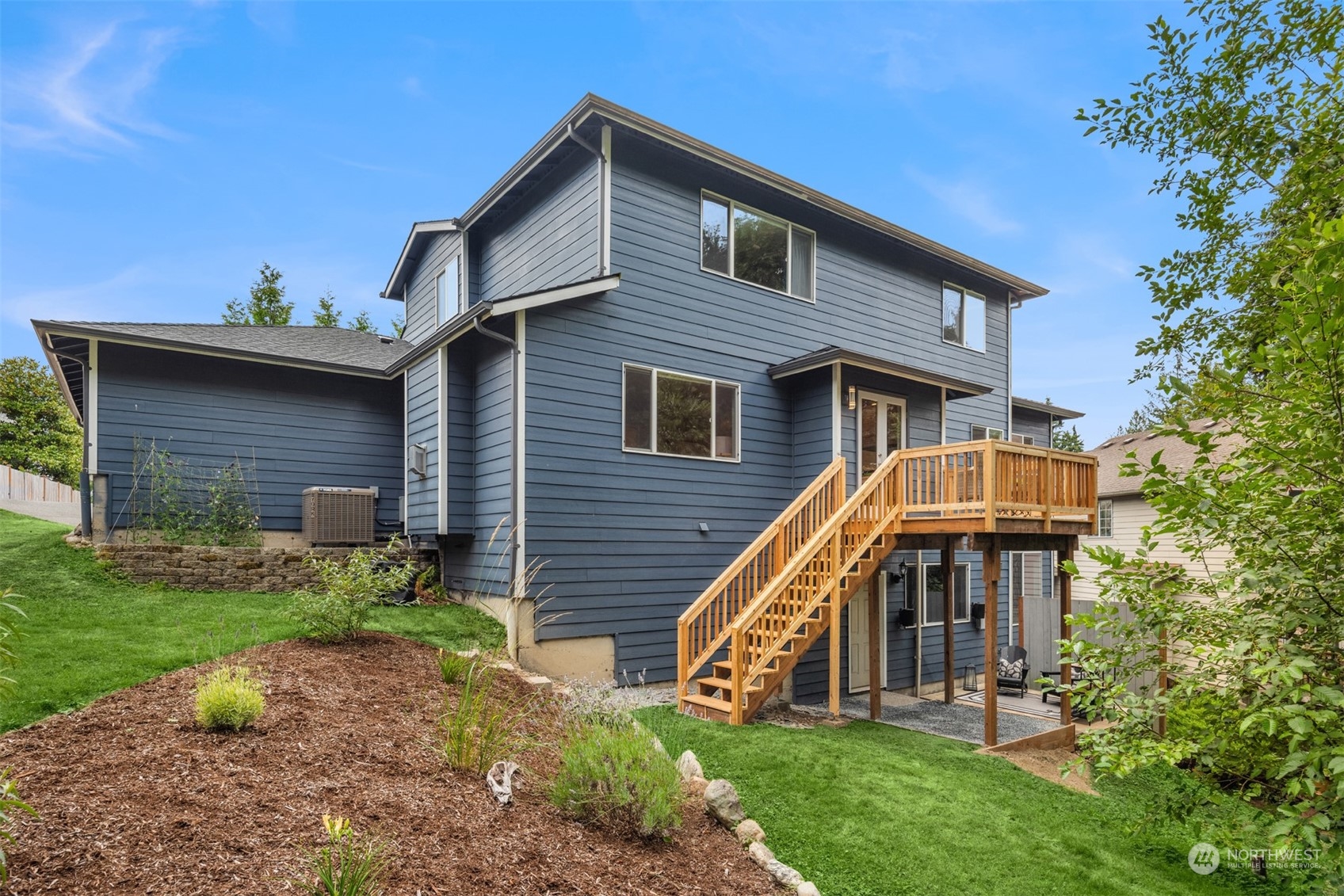 23021 21st Avenue Southeast Bothell, WA 98021 - Photo 28 of 29 a view of a house with a yard