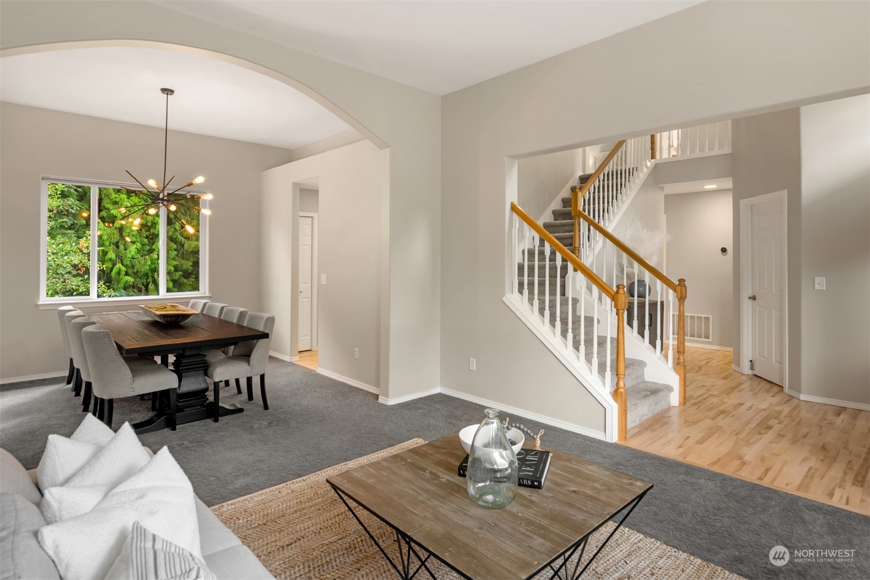 23021 21st Avenue Southeast Bothell, WA 98021 - Photo 5 of 29 a view of a dining room with furniture window and wooden floor