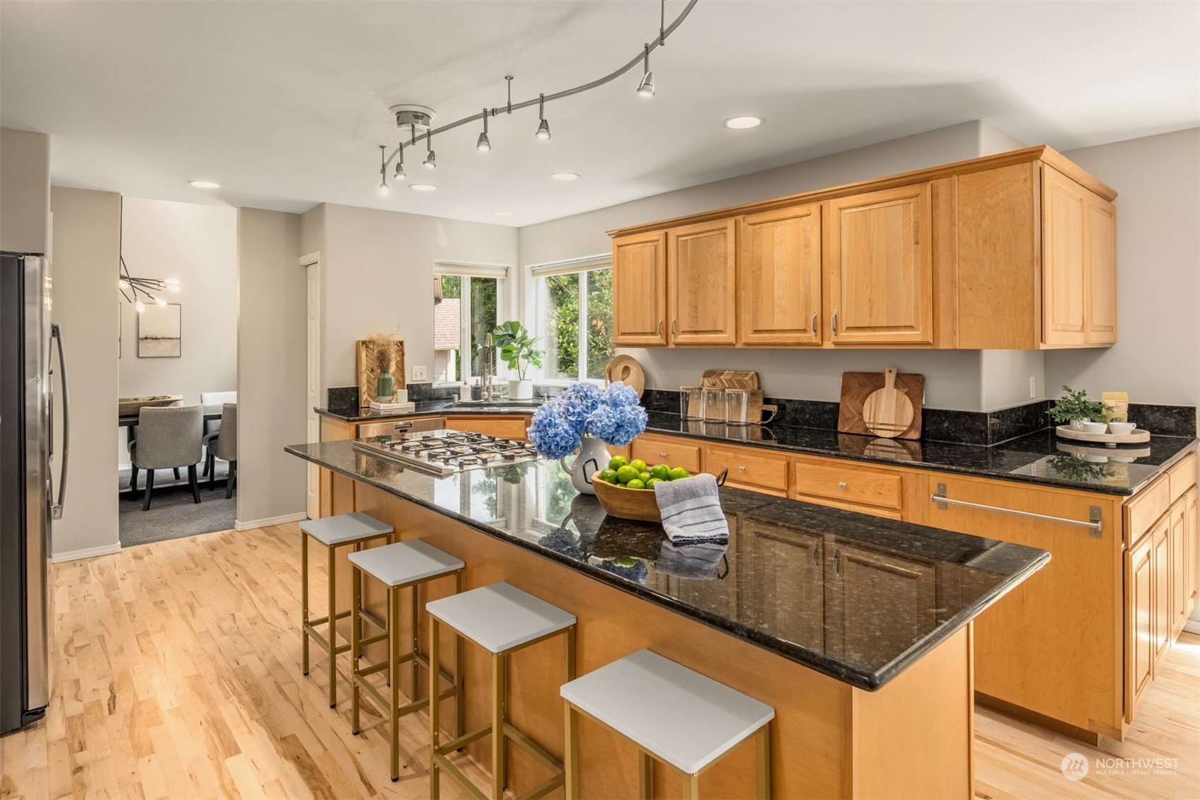 23021 21st Avenue Southeast Bothell, WA 98021 - Photo 9 of 29 a kitchen with stainless steel appliances granite countertop a sink counter space and a window