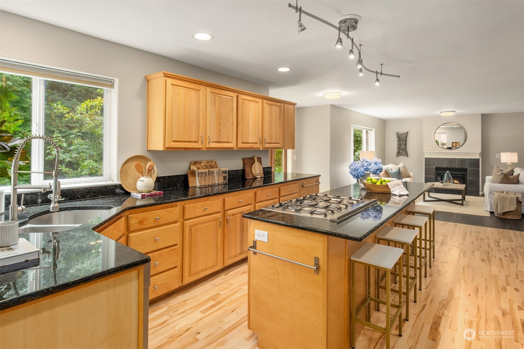 23021 21st Avenue Southeast Bothell, WA 98021 - Photo 10 of 29 a kitchen with stainless steel appliances granite countertop a sink stove and refrigerator
