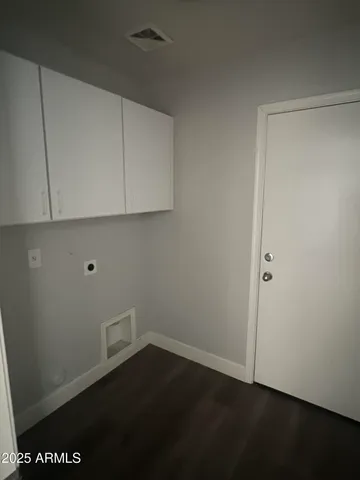 a view of small space with wooden floor