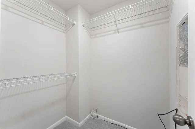 a view of a room with racks on the wall