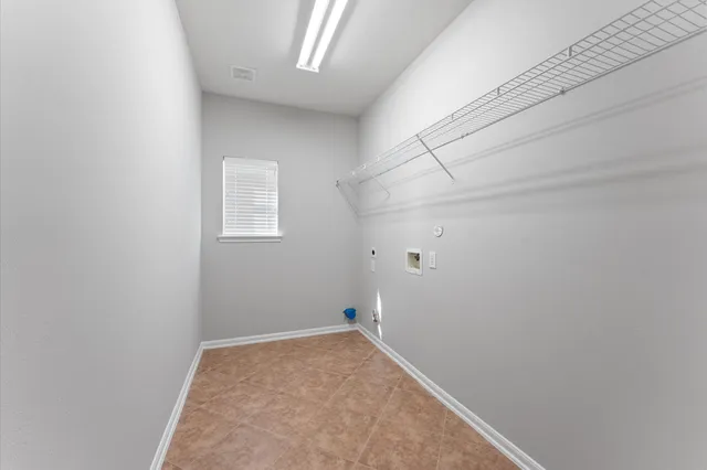 an empty room with a workbench