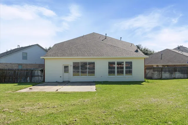 a house view with a garden space