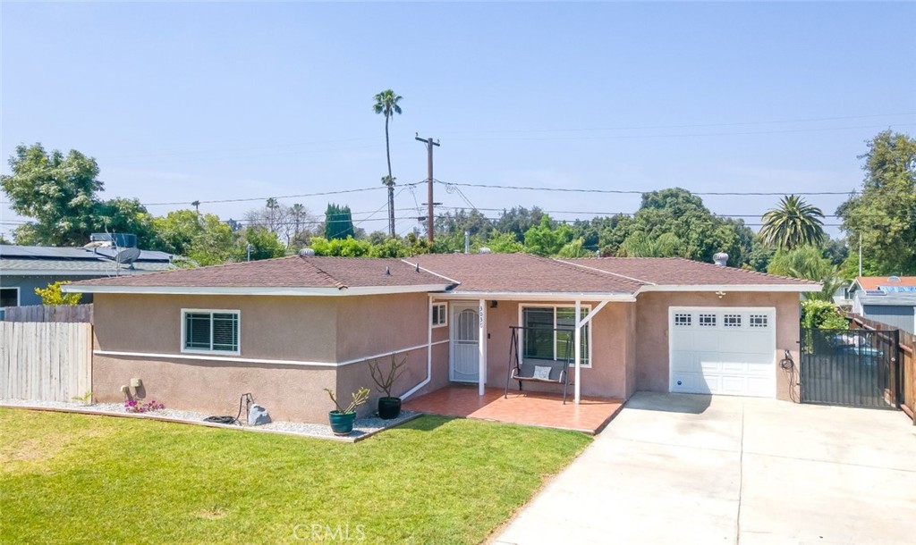 3036 David Street Riverside, CA 92506 - Photo 1 of 1 a aerial view of a house with a yard and potted plants