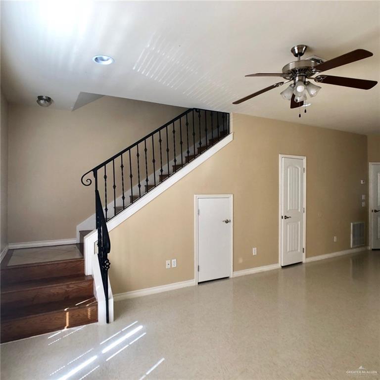 804 North Taylor Road, Unit 29 Mission, TX 78572 - Photo 14 of 27 a view of a hallway with staircase