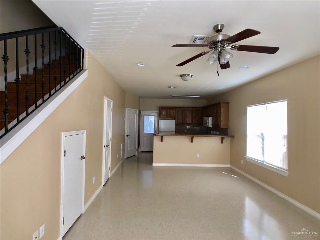 804 North Taylor Road, Unit 29 Mission, TX 78572 - Photo 27 of 27 a view of a livingroom with a window and a ceiling fan
