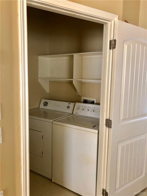 804 North Taylor Road, Unit 29 Mission, TX 78572 - Photo 7 of 27 a utility room with dryer and washer